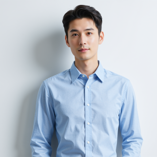 Thirty-year-old male portrait wearing business shirt, light background